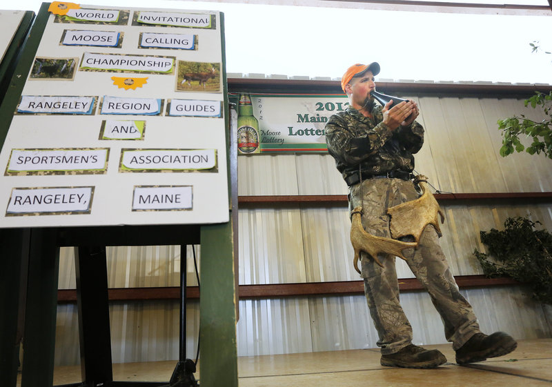Moose Calling World Championships and Moose Lottery in Oquossoc. Kevin Deschaine of Madawaska, the 2012 moose calling champion, demonstrates a call during the competition. Photographed on Saturday, June 23, 2012.