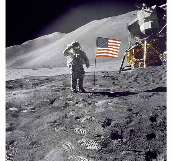 One small step for man, one giant leap toward lunar tourism: Apollo 15 commander Dave Scott salutes the American flag at the Hadley-Apennine lunar landing site. The lunar module Falcon is visible on the right.