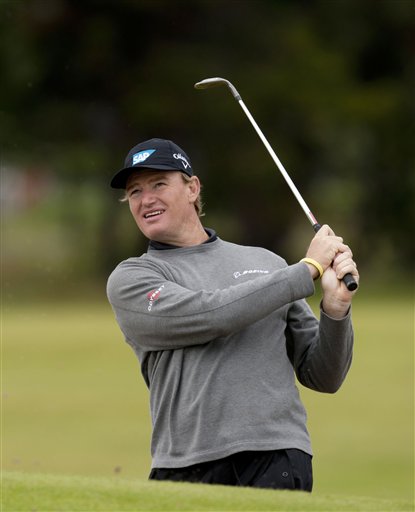 South Africa's Ernie Els hits a shot out of a bunker during a practice round at the Royal Lytham & St Annes golf club before the forthcoming British Open Golf tournament, Lytham St Annes, England, Monday, July 16, 2012. (AP Photo/Jon Super)