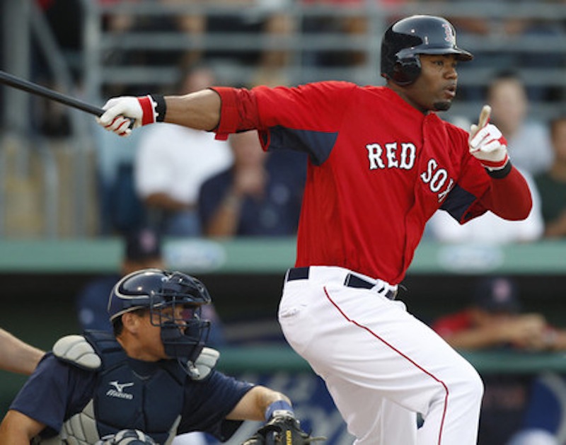 Boston Red Sox outfielder Carl Crawford hits against the Tampa Bay Rays during a spring training baseball game in Fort Myers, Fla. in 2011. The four-time All Star will be playing for the Portland Sea Dogs at Hadlock Field on Tuesday, July 2, as part of a rehab assignment. (AP Photo/Charles Krupa)