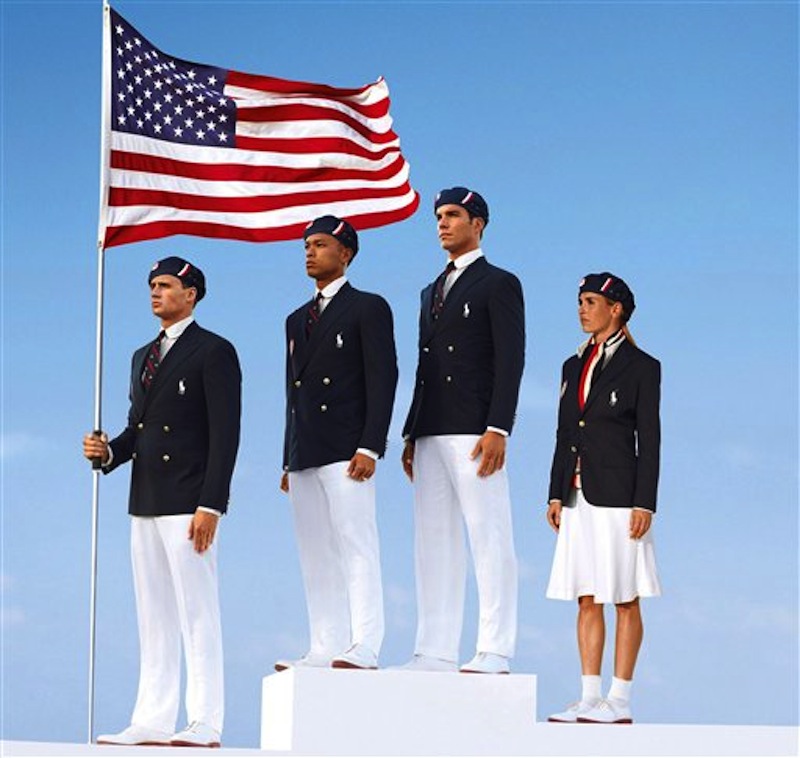 This product image released by Ralph Lauren shows U.S. Olympic athletes, from left, swimmer Ryan Lochte, decathlete Bryan Clay, rower Giuseppe Lanzone and soccer player Heather Mitts modeling the the official Team USA Opening Ceremony Parade Uniform. Republicans and Democrats railed Thursday, July 12, 2012 about the U.S. Olympic Committee's decision to dress the U.S. team in Chinese manufactured berets, blazers and pants while the American textile industry struggles economically with many U.S. workers desperate for jobs. (AP Photo/Ralph Lauren, File)