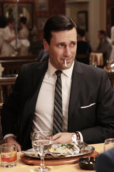 In this publicity image released by AMC, Jon Hamm portrays Don Draper in the AMC series, "Mad Men." The series was nominated for an Emmy for best drama series, and Jon Hamm was nominated for best actor in a drama series on Thursday, July 14, 2011. The Emmy awards will be presented on Sept. 18. (AP Photo/AMC)