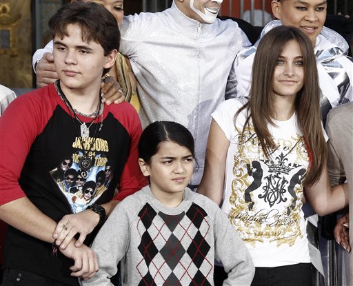 This Jan. 26, 2012, photo shows, from left, Prince Jackson, Blanket Jackson and Paris Jackson after a hand and footprint ceremony honoring their father Michael Jackson in front of Grauman's Chinese Theatre in Los Angeles.