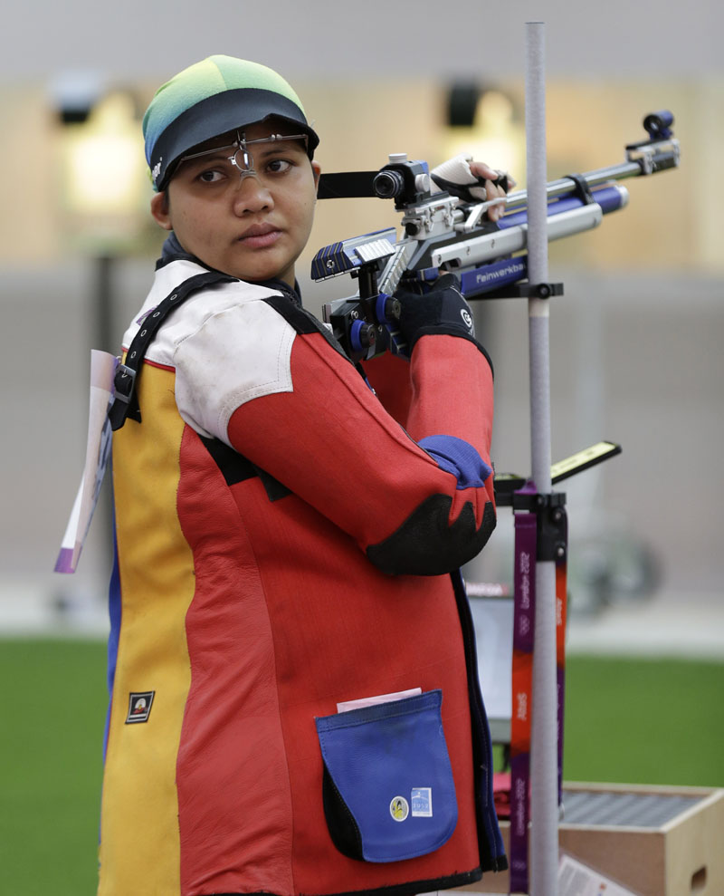 Malaysian shooting athlete Nur Suryani Mohamed Taibi, who is eight months pregnant, trains for the 10-meter air rifle event at the Royal Artillery Barracks, ahead of the the start of the 2012 Summer Olympics.