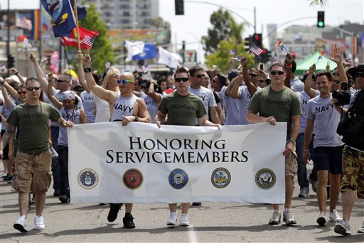 Service members march in last year's Gay Pride Parade in San Diego. The Defense Department has announced it is allowing service members to march in uniform in this year's parade for the first time in U.S. history.