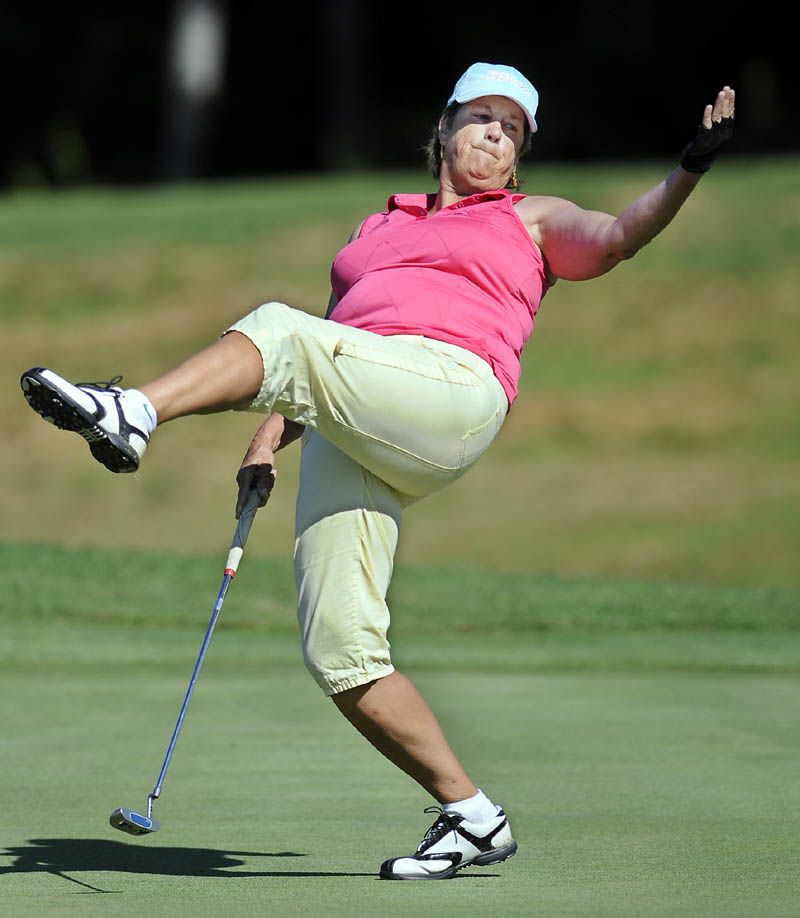 BODY LANGUAGE: Dale Hannon reacts to a putt Monday during the New England Women’s Golf Association Championship at Natanis Golf Course in Vassalboro. Hannon is tied for 38th afters shooting a first-round 90.