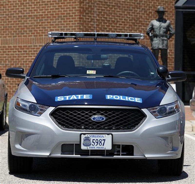 One of the new Ford Taurus police cruisers that will replace the Crown Victoria models sits at Virginia State Police headquarters Friday, June 15, 2012. (AP Photo/Richmond Times-Dispatch, Bob Brown)