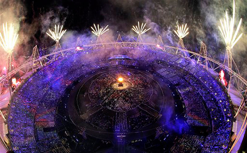 Fireworks light up over the stadium during the Opening Ceremony at the 2012 Summer Olympics, Saturday, July 28, 2012, in London. (AP Photo/David J. Phillip) 2012 London Olympic Games Summer Olympic games Olympic games Spo