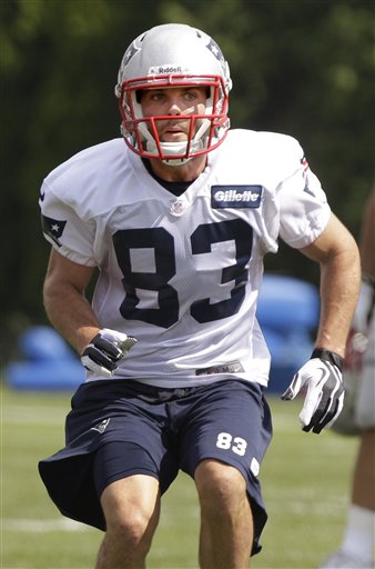 New England Patriots wide receiver Wes Welker runs a pass route during practice on the first day of the NFL football team's training camp Thursday in Foxborough, Mass.