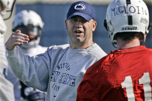 Penn State football coach Bill O' Brien gives instruction to quarterback Matt McGloin in this March 26, 2012, photo.