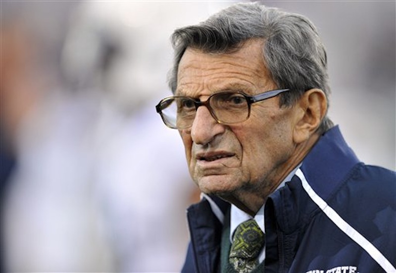 In this Oct. 22, 2011 file photo, Penn State coach Joe Paterno stands on the field before his team's NCAA college football game against Northwestern, in Evanston, Ill. Paterno defended his football program's integrity in a 7-month-old letter released Wednesday, a day ahead of a report that could forever mar his legacy. (AP Photo/Jim Prisching, File)