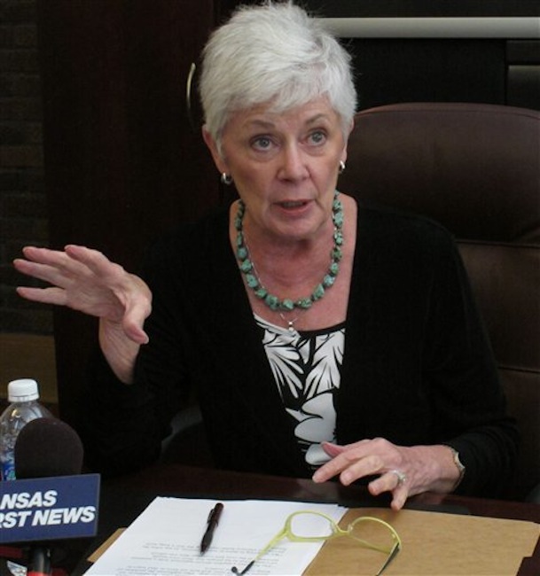 This photo from Thursday, June 28 2012, shows Kansas Insurance Commissioner Sandy Praeger answering questions from reporters in Topeka, Kan., about the federal health care overhaul upheld by the U.S. Supreme Court. Praeger acknowledges that her opinion of the federal law is far more favorable than that of most Kansas Republicans. (AP Photo/John Hanna)