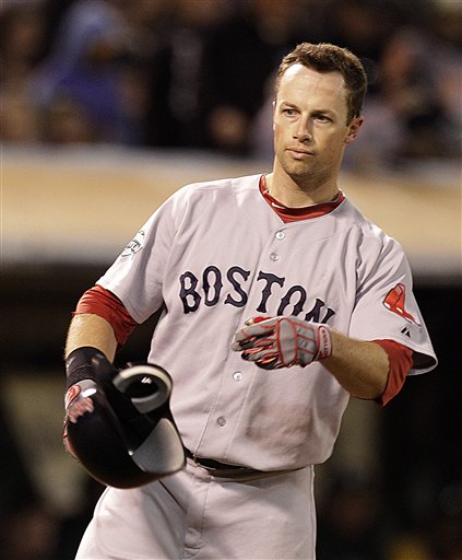 Boston Red Sox's Daniel Nava tosses his helmet after striking out to Oakland Athletics' Sean Doolittle in the seventh inning of a baseball game Monday, July 2, 2012, in San Francisco. (AP Photo/Ben Margot)
