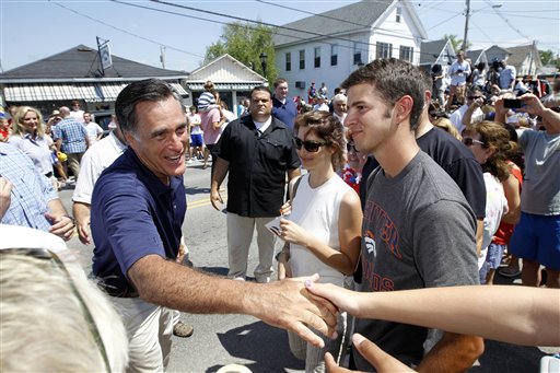 Republican presidential candidate Mitt Romney participates in the Fourth of July Parade in Wolfeboro, N.H., today.