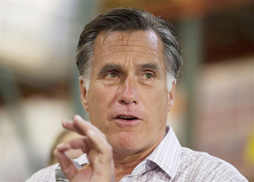 Republican presidential candidate, former Massachusetts Gov. Mitt Romney gestures during remarks in Colorado Springs on Tuesday, July 10, 2012. Romney said Friday he won't release any tax returns before 2010. (AP Photo/Evan Vucci)