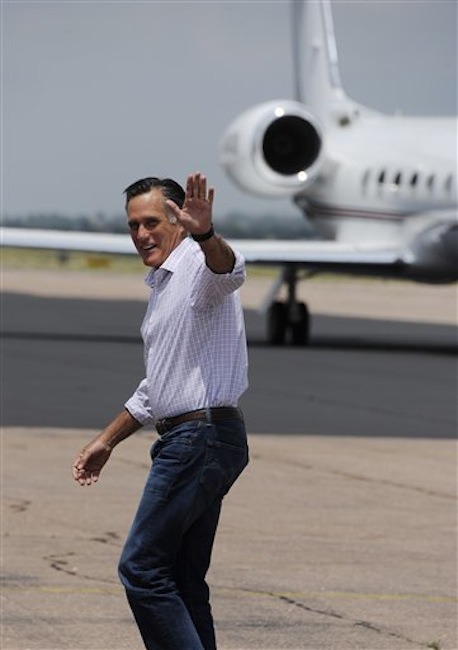 Republican presidential candidate Mitt Romney waves as he arrives at the Colorado Jet Center in Colorado Springs, Colo. for a campaign visit Tuesday, July 10, 2012. (AP Photo/The Gazette, Mark Reis) MARK REIS;MITT ROMNEY