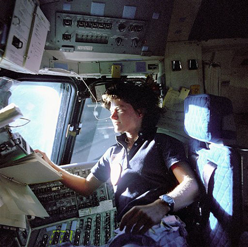 In this June 1983 photo released by NASA, astronaut Sally Ride, a specialist on shuttle mission STS-7, monitors control panels from the pilot's chair on the shuttle Columbia flight deck. Ride, the first American woman in space, died Monday, July 23, 2012 after a 17-month battle with pancreatic cancer. She was 61. (AP Photo/NASA, File)