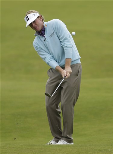 Brandt Snedeker of the United States plays shot on the seventh hole at Royal Lytham & St Annes golf club during the second round of the British Open Golf Championship, Lytham St Annes, England, Friday, July 20, 2012. (AP Photo/Peter Morrison)