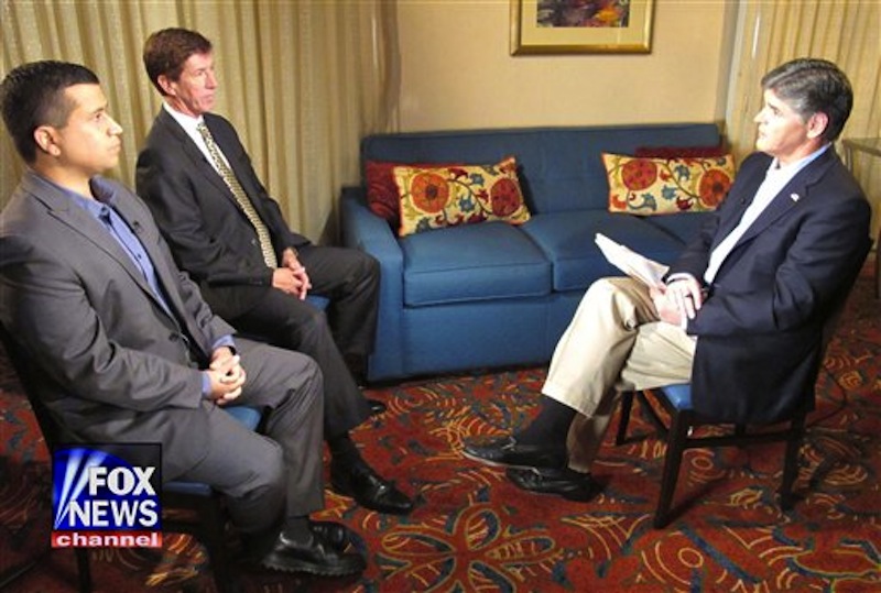 In this photo provided by the Fox News Channel, Fox News Channel host Sean Hannity, right, interviews George Zimmerman, left, and his attorney Mark OíMara, Wednesday, July 18, 2012 at an undisclosed Florida location. Zimmerman has been charged with second degree murder for the Feb. 26, 2012 shooting death of Florida teenager Trayvon Martin. He is claiming self-defense under Floridaís ìStand Your Groundî law. The telecast airs Wednesday at 9 p.m. on the Fox News Channel. (AP Photo/Fox News Channel)