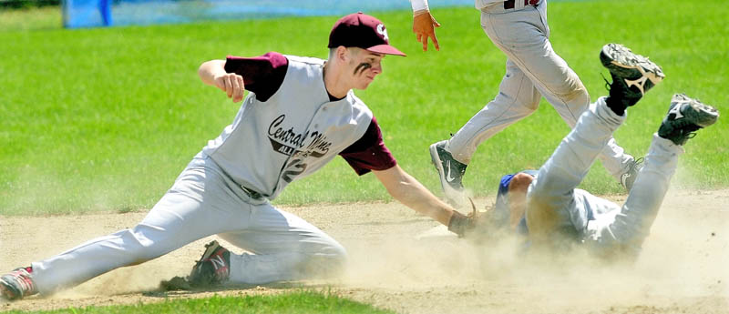 Central Maine's Ben Frazee tags out Midcoast's Andrew Hall at second base during 14-year-old Babe Ruth state championship tournament Sunday in Fairfield.