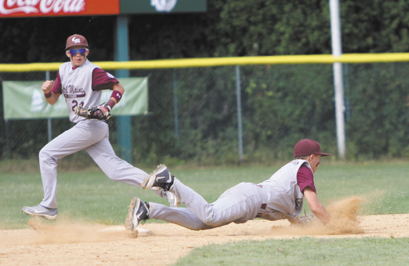 DIVING STOP: J.T. Nutting makes a diving play up the middle during Central Maine’s game against Dedham, Mass. on Sunday in Winooski, Vt. hurricanes regional 2