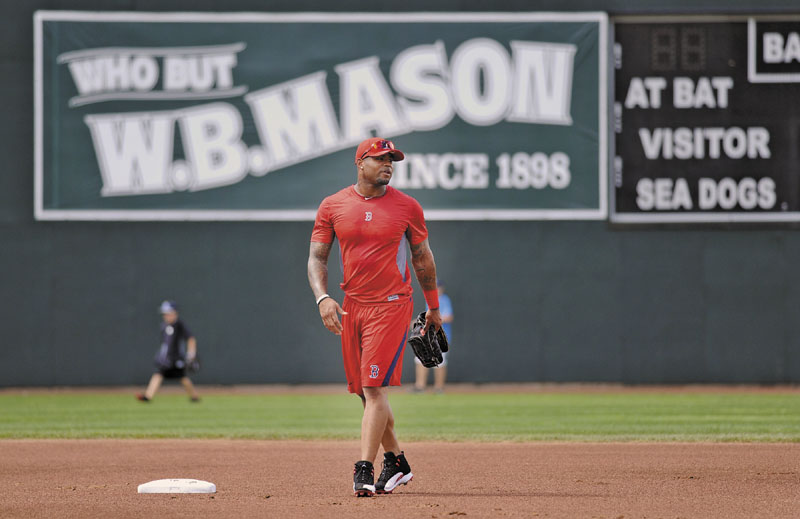 Boston Red Sox outfielder Carl Crawford gets familiar with Hadlock Field in Portland on Wednesday as he prepares for a rehab appearance with the Sea Dogs