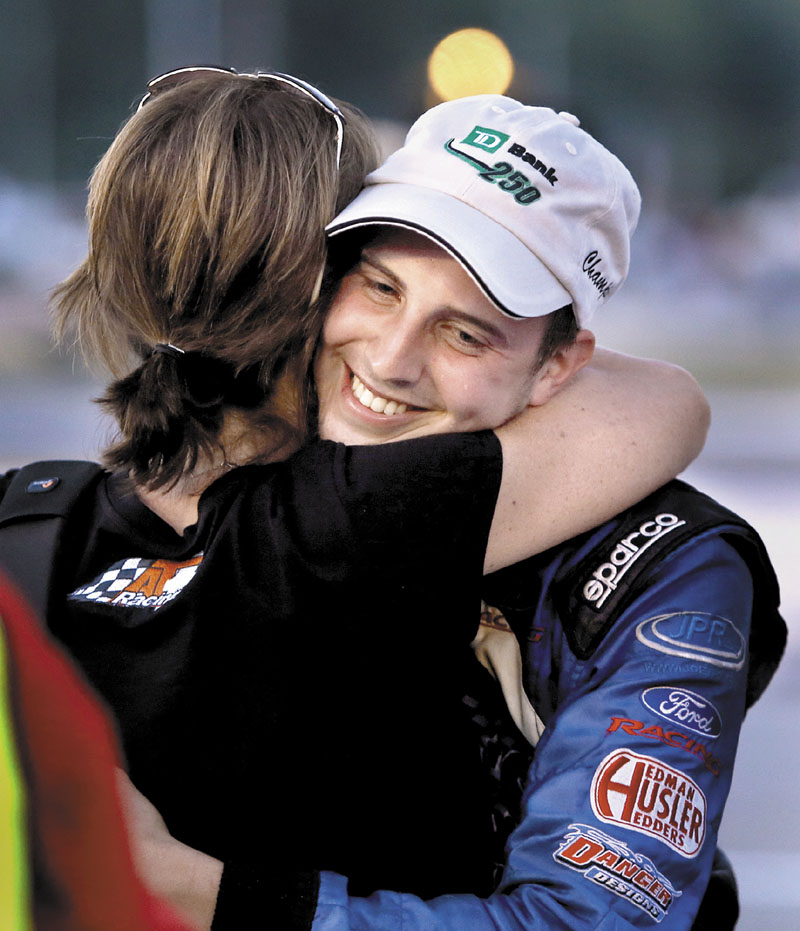 CONGRATS: Joey Polewarczyk, Jr. hugs his soon to be mother-in-law Terry Theriault after winning the TD Bank Oxford 250 on Sunday at Oxford Plains Speedway in Oxford.