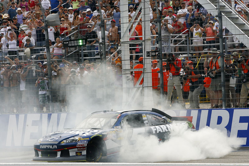 UP IN SMOKE: Kasey Kahne performs a burnout after winning the NASCAR Sprint Cup Series race at New Hampshire Motor Speedway on Sunday in Loudon, N.H.