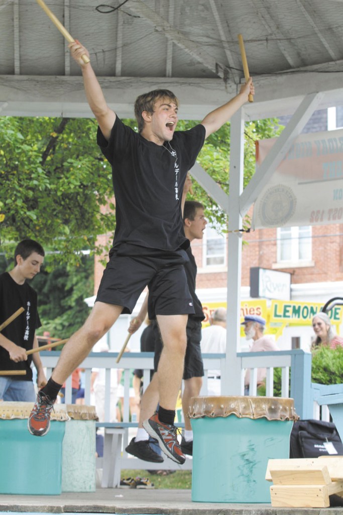 Greg Plourde of Dresden performs with the Hall-Dale Taiko Drummers at Richmond Days on Saturday. The group is comprised of Hall-Dale High School students and is led by Naoto Kobayashi.