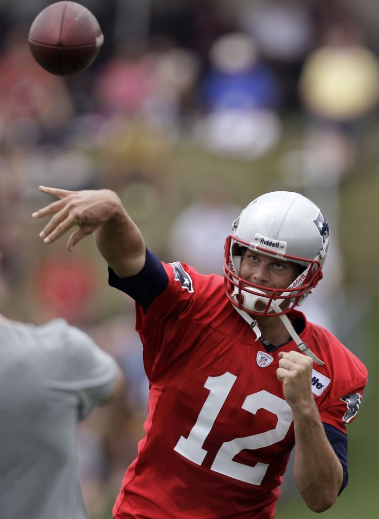 LOOKING GOOD: New England Patriots quarterback Tom Brady is back for his 13th season with the team. Brady celebrates his 35th birthday Friday.