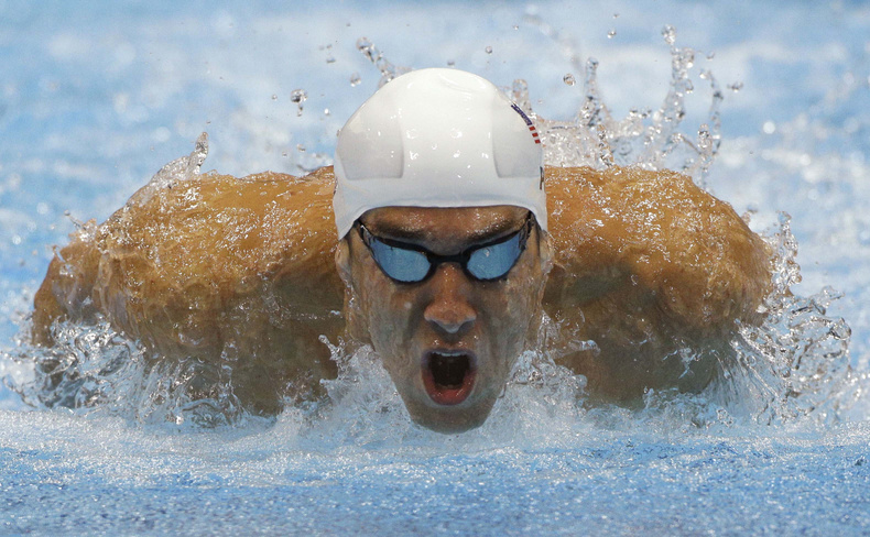 Michael Phelps of the US competes in a heat of the men's 400-meter individual medley at the 2012 Summer Olympics on Saturday. 2012 London Olympic Games Summer Olympic games Olympic games Spo