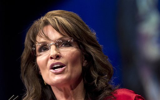 FILE - In this Feb. 11, 2012 file photo, Sarah Palin, the GOP candidate for vice-president in 2008, and former Alaska governor speaks in Washington. Sarah Palin and George W. Bush won�t be in Tampa. Hillary Rodham Clinton and Al Gore aren�t making the trip to Charlotte. And scores of other Republican and Democratic stars are taking a pass as their parties gather at every-four-years national conventions. The reasons are varied _ and political. (AP Photo/J. Scott Applewhite)