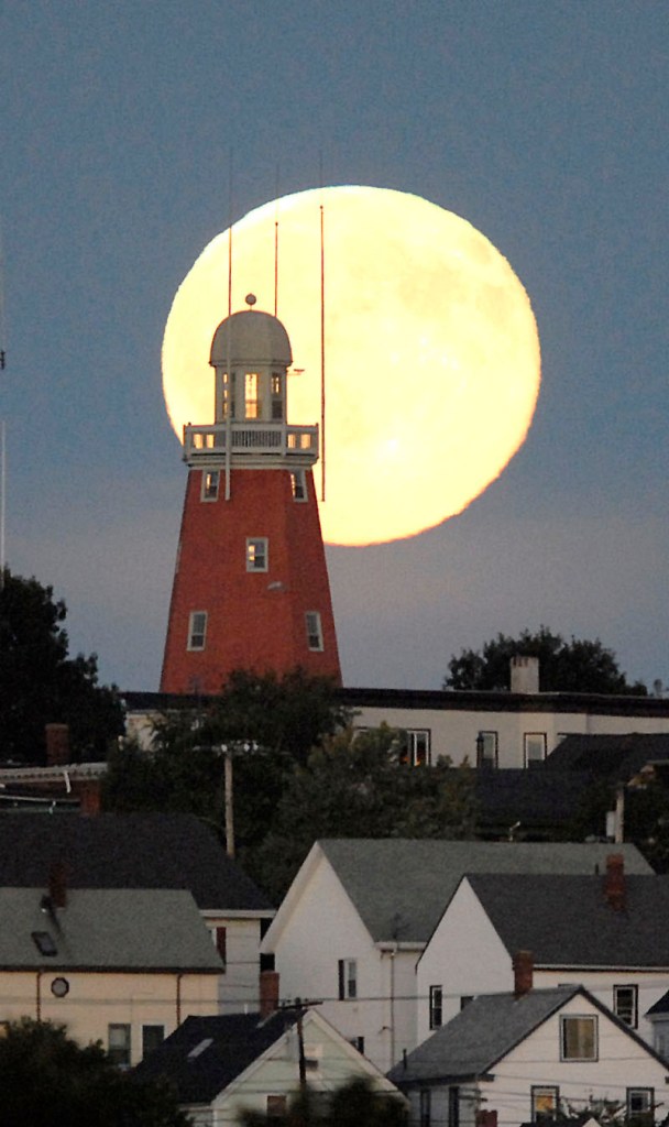 A blue moon shines over the Back Bay of the city skyline of Munjoy Hill's Portland Observatory on Sept. 15, 2008