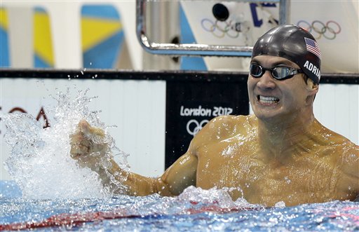 United States' Nathan Adrian celebrates after winning the men's 100-meter freestyle swimming final at the Aquatics Centre in the Olympic Park during the 2012 Summer Olympics in London, Wednesday.