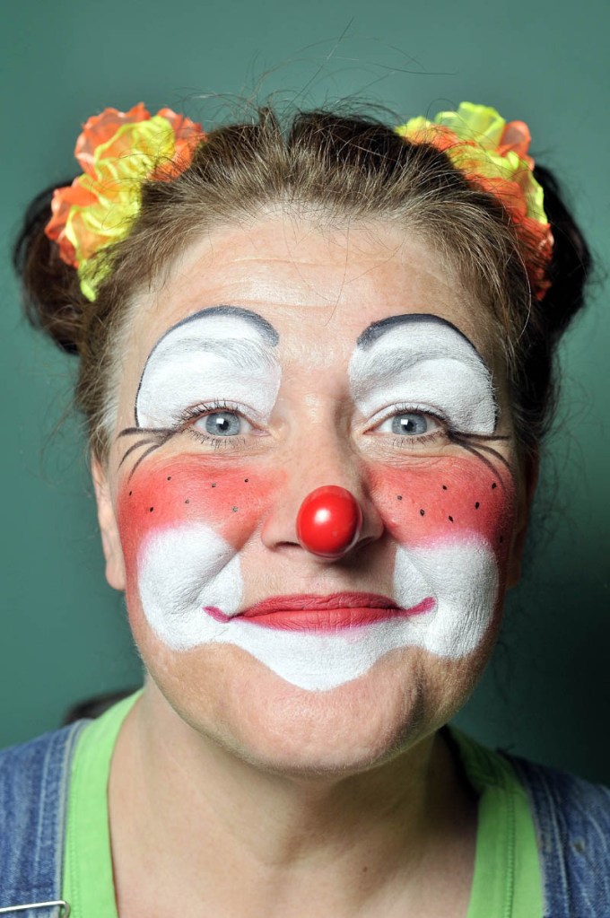Anotonia Smith of Oakland, a.k.a Wingnut the Clown, shows off her clown visage.