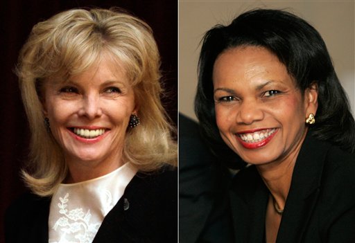 South Carolina financier Darla Moore, left, and former U.S. Secretary of State Condoleeza Rice will become the first women in green jackets when Augusta National Golf Club opens for a new season in October.