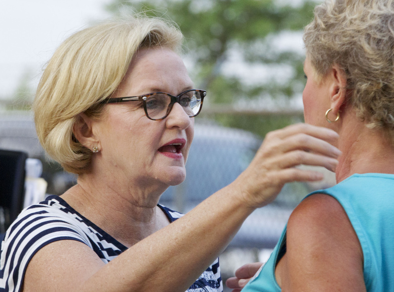 Sen. Claire McCaskill, D-Mo., talks with a supporter at the Missouri State Fair in Sedalia, Mo., last week. On Thursday, McCaskill derided a new survey that suddenly showed her leading Republican Todd Akin by 10 points -- 48 to 38 percent.