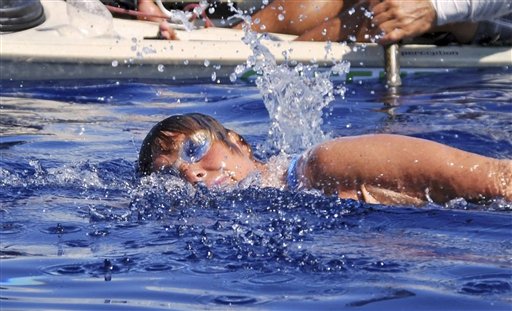 In this photo provided by Diana Nyad via the Florida Keys News Bureau, endurance swimmer Diana Nyad swims in the Florida Straits between Cuba and the Florida Keys Sunday.