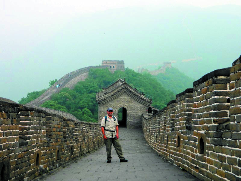 AT THE WALL: University of Maine at Augusta professor Robert Katz at the Great Wall of China.