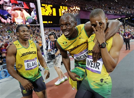 Jamaica's Usain Bolt, center, Jamaica's Yohan Blake, left, and Jamaica's Warren Weir celebrate their medals in the men's 200-meter final during the athletics in the Olympic Stadium at the 2012 Summer Olympics, London, Thursday, Aug. 9, 2012. Bolt won gold, Blake silver and Weir bronze. (AP Photo/David J. Phillip) 2012 London Olympic Games Summer Olympic games Olympic games Sports Events XXX Olympiad