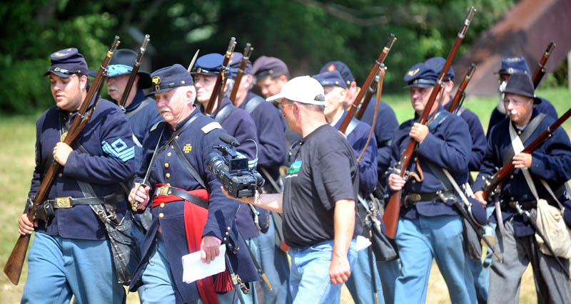 Maine Public Broadcasting Network films the 20th Maine Regiment during a Civil War re-enactment at Good Will-Hinkley in Fairfield Saturday. Events continue today and are open to the public from 9 a.m. to 2 p.m. A $5 donation is suggested.