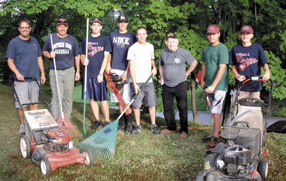 Contributed photo Pictured from left to right: Ryan Karkas, coach Troy Crane, Nate Pushard, Brian Crane, Tucker Beaudion, Emmitt Stuart, Brandon Dubue, and Kyle Karkos. Seven members of the American Legion Baseball Team post 153, spent a sunny day giving back to the American Legion? The team players woke up bright and early to give back to their community and to veterans. This time it wasn�t baseball bats, balls and gloves they were handling but rather a lawn mower, weed wacker, rake, a chain saw and an eager attitude. They spent the day mowing, raking, bagging and cutting up small fire wood for Veteran, Emmett Stuart. The team players wanted to show their appreciation for participating in the American Legion 2012 Baseball season. They called the post to inquire on what could be done. Past Commander Hugh Brown suggested helping past Commander Emmitt Stuart who served as a commander for several terms and was instrumental in sending supplies to the troops in Iraq and Afghanistan. Stuart has been a long time member of the American Legion and the VFW and has strongly supported both veteran organizations stated Brown. Community service has long been a requirement to graduate from certain high schools across the country and community service is always a winner for everyone involved stated Brown. For information on the 2013 American Legion Baseball season contact Tibby Dupuis at the William J. Rogers post home at 1-(207) 782-1118 or email us at ampost153auburn@gmail.com or at legionpost153me.org