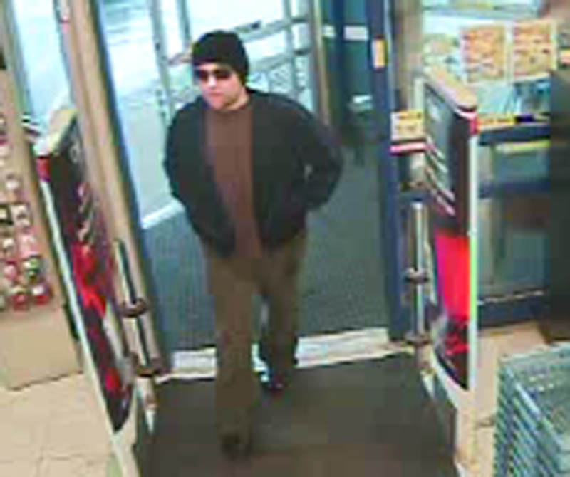 Police are looking for the man in this security camera photo who robbed the Rite Aid pharmacy of drugs in Newport Thursday evening.