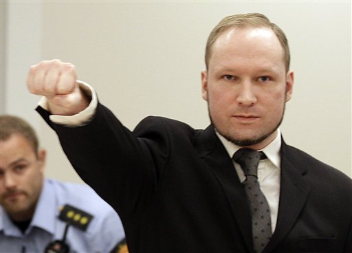 Mass murderer Anders Behring Breivik, makes a salute after he arrives at the courthouse in Oslo today.