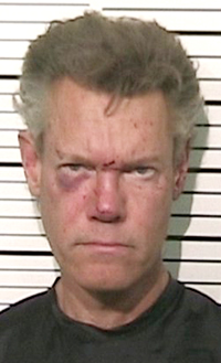 This photo provided by the Grayson County, Texas, Sheriff�s Office shows Country singer Randy Travis who has been charged with driving while intoxicated. Authorities say Travis was being jailed without bond Wednesday, Aug. 8, 2012, pending an appearance before a judge in Sherman, Texas, about 60 miles north of Dallas. (AP Photo/Grayson County Sheriff's Office)
