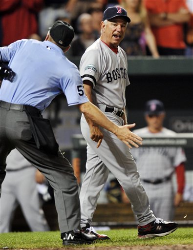 Boston Red Sox manager Bobby Valentine is ejected by home plate umpire Mike Everitt in the eighth inning of a baseball game against the Baltimore Orioles, Wednesday, Aug. 15, 2012, in Baltimore. The Orioles won 5-3. (AP Photo/Gail Burton)