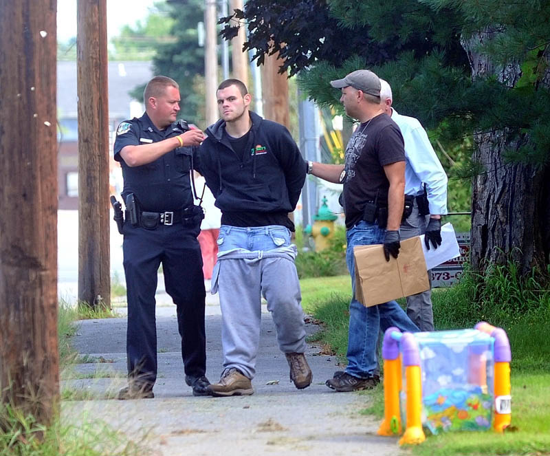 Waterville Police and Maine State Police apprehend two suspects on Pleasant Street in Waterville in connection to a Rite Aid robbery this morning.