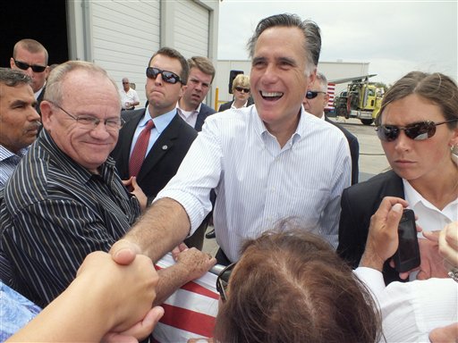 Republican presidential candidate Mitt Romney shakes hands during a campaign event at Watson Truck and Supply on Thursday in Hobbs, N.M.