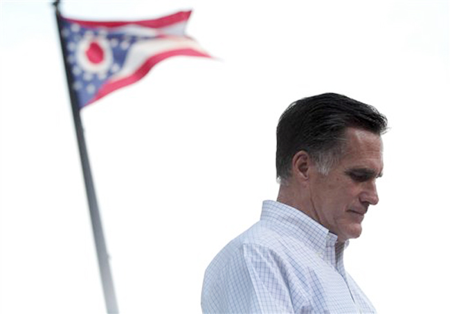 The Ohio state flag flies in the background while Republican presidential candidate Mitt Romney speaks during a campaign event at the Ross County Court House on Tuesday in Chillicothe, Ohio.