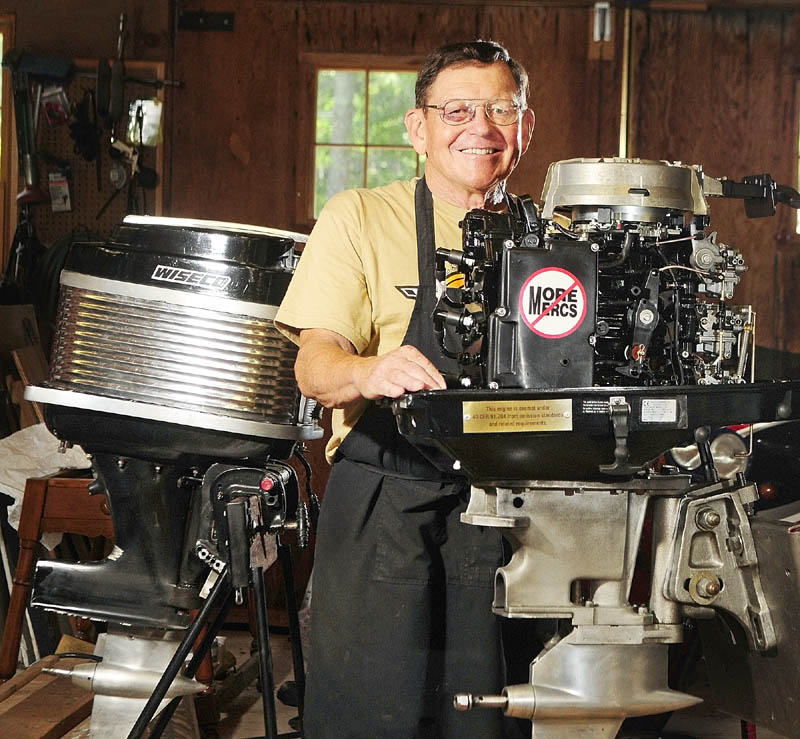 Alex Pollakoff works on motors for hydrofoil race boats in his shop in Bowdoinham.